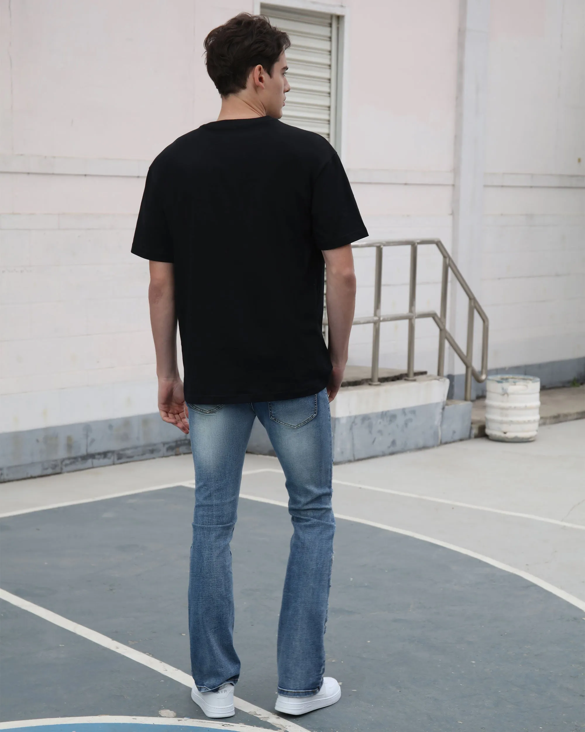 Medium Wash Blue Jeans with Ripped Text