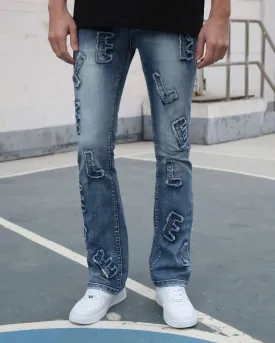 Medium Wash Blue Jeans with Ripped Text