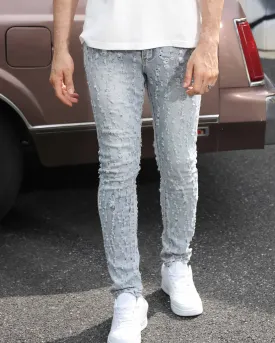Slim Fit Light Wash Blue Ripped Jeans with Small Rips