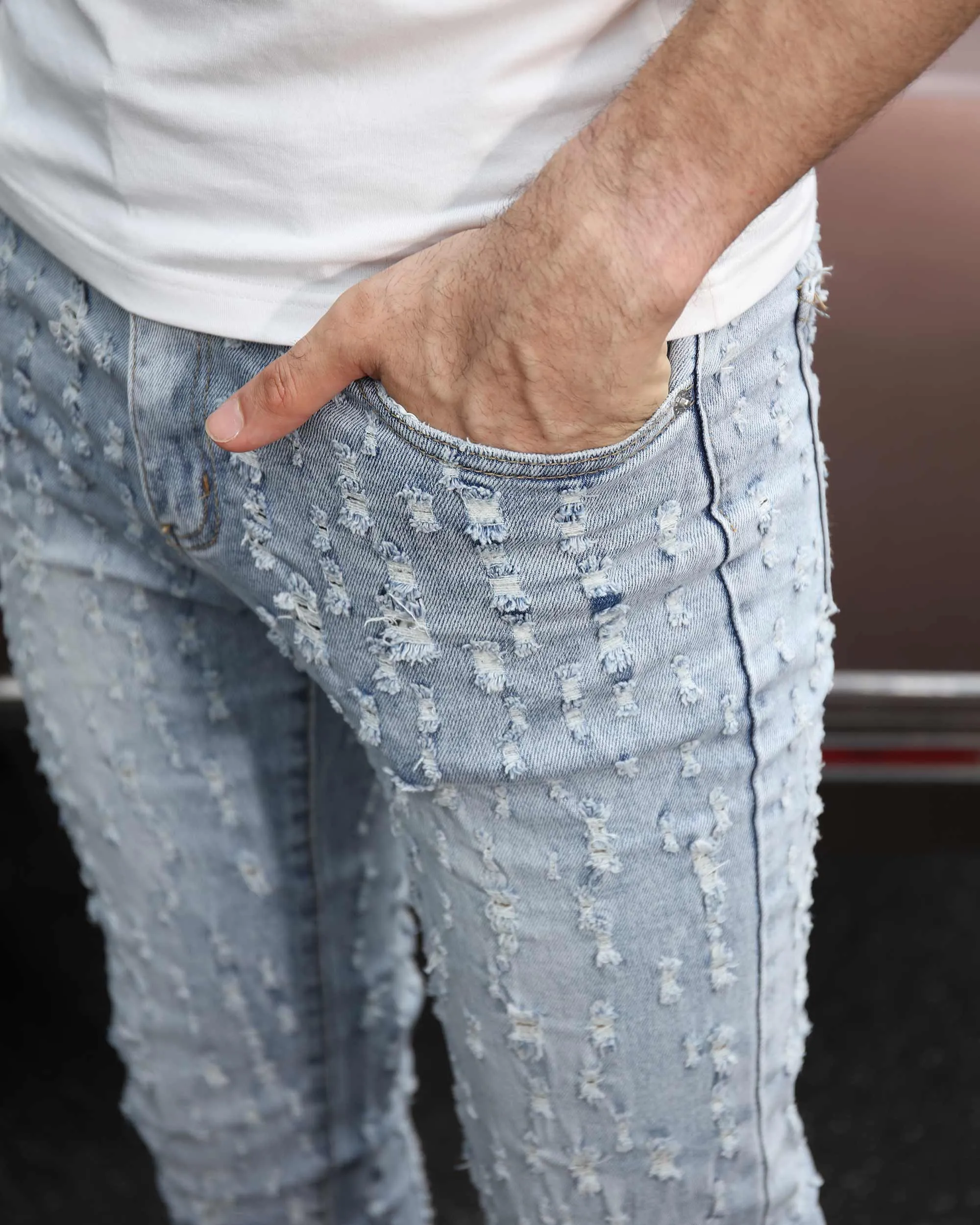 Slim Fit Light Wash Blue Ripped Jeans with Small Rips